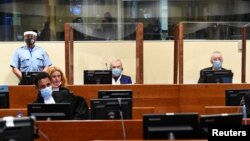 Jovica Stanišić i Franko Simatović tokom izricanja presude, 30. juni 2021. REUTERS/Piroschka van de Wouw/Pool