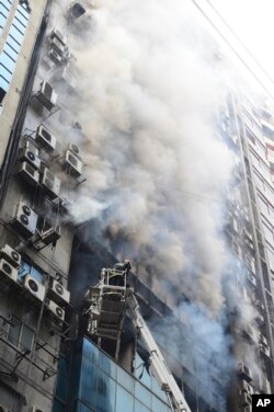A fire in a high-rise office building in Bangladesh's capital Dhaka Thursday killed 25 people and injured dozens more, police said.