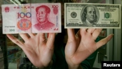 China approved a bank in New York City as a clearing center for Chinese currency, the renminbi. China's premier invited other banks to do the same.