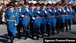 FILE - Members of a Bosnian Serb honor guard unit march in the northern Bosnian city of Banja Luka, Jan. 9, 2020, during a ceremony marking the 28th anniversary of the founding of Republika Srpska, a Bosnian Serb entity within Bosnia and Herzegovina.