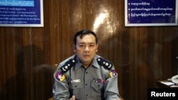 Chief Superintendent Zaw Min Oo talks to the media during a news conference about riots in Mandalay, July 2, 2014. 