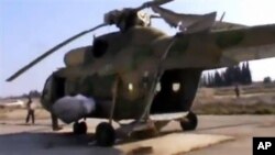 28일 다마스쿠스 인근의 반군 공군기지에 억류된 정부군 헬리콥터. (자료사진)
