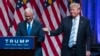 Indiana Valisi Mike Pence'i (solda) başkan yardımcısı seçimi olarak tanıtan Cumhuriyetçi Parti adayı Donald Trump