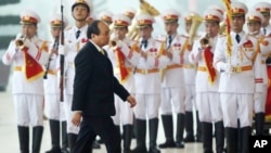 Phó Thủ tướng Việt Nam Nguyễn Xuân Phúc đến Trung tâm Hội nghị Quốc gia ở Hà Nội để tham dự lễ khai mạc Đại hội Đảng 12, ngày 21/1/2016.