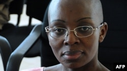 ARCHIVES - Victoire Ingabire, l'opposante rwandaise, le 10 novembre 2011 à la Haute Cour de Kigali. 