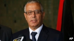 Libyan's Prime Minister Ali Zeidan speaks to the media during a press conference in Rabat, Morocco, Oct. 8, 2013 