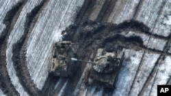 This February 2023 image from Ukrainian Armed Forces shows damaged Russian tanks in a field after attempting to attack Vuhledar, Ukraine.