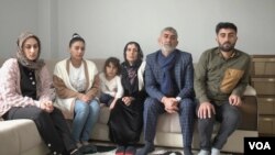 Barış Büyüksu with his family