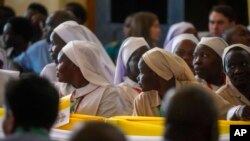 Nuns wait for the arrival of Pope Francis for a meeting with priests, deacons, consecrated people and seminarians at the Cathedral of Saint Theresa in Juba, South Sudan, Feb. 4, 2023.