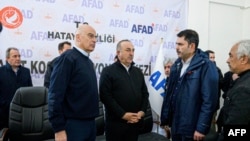 This handout photograph taken and released, Feb. 12, 2023 by the Greek Foreign Ministry shows Greece's Foreign Minister Nikos Dendias (L) and his Turkish counterpart Mevlut Cavusoglu during their visit to Adana, Turkey. (Greek Foreign Ministry/AFP)