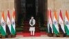 Indian Prime Minister Narendra Modi waits for Egyptian President Abdel Fattah El Sisi to arrive before their meeting at the Hyderabad House in New Delhi, Jan. 25, 2023. 