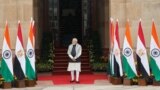 Indian Prime Minister Narendra Modi waits for Egyptian President Abdel Fattah El Sisi to arrive before their meeting at the Hyderabad House in New Delhi, Jan. 25, 2023. 