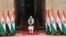 Indian Prime Minister Narendra Modi waits for Egyptian President Abdel Fattah El Sisi to arrive before their meeting at the Hyderabad House in New Delhi, Jan. 25, 2023. 