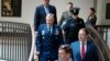 Lawmakers and intelligence advisers, including Gen. Glen VanHerck, left, commander of the U.S. Northern Command and North American Aerospace Defense Command, arrive for a closed briefing on the Chinese surveillance balloon that flew over the U.S., in Washington, Feb. 9, 2023.