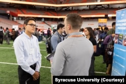 Students attend a career fair in late 2022 at Syracuse University.