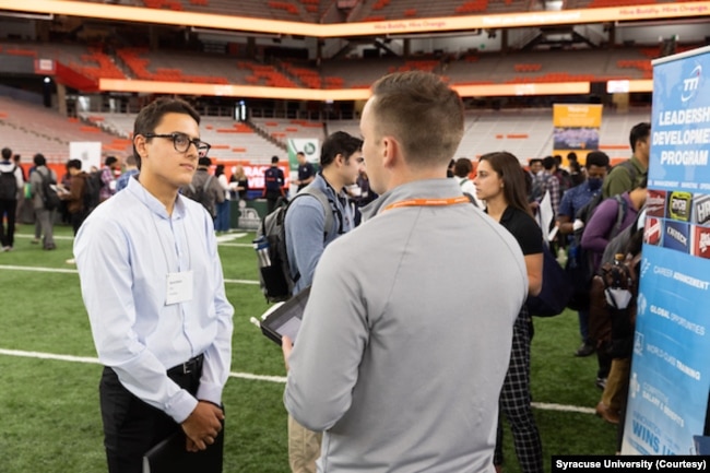 Students attend a career fair in late 2022 at Syracuse University.