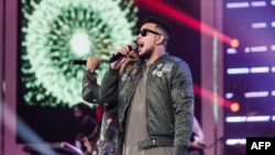 FILE - South Africa multi-award-winning artist Kiernan Forbes, popularly known as AKA, performs at the South African Music Awards in Durban.