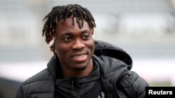 FILE - Christian Atsu, then playing for Newcastle United, arrives before a match at St. James' Park, Newcastle, Britain, Jan. 25, 2020.