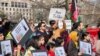 FILE - People demonstrate in front of the White House in Washington, Jan. 1, 2023, against the Afghan Taliban regime's ban on higher education for women.