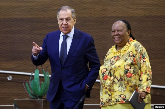 FILE - South Africa's Foreign Minister Naledi Pandor and Russia's Foreign Minister Sergei Lavrov speak ahead of a bilateral meeting, in Pretoria, South Africa, Jan. 23, 2023.