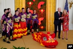 FILE - U.S. President Joe Biden and first lady Jill Biden speak during a reception to celebrate the Lunar New Year in the East Room of the White House in Washington on Jan. 26, 2023.