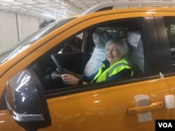 U.S. Treasury Secretary Janet Yellen checking a vehicle in South Africa. (Photo: Thuso Khumalo)