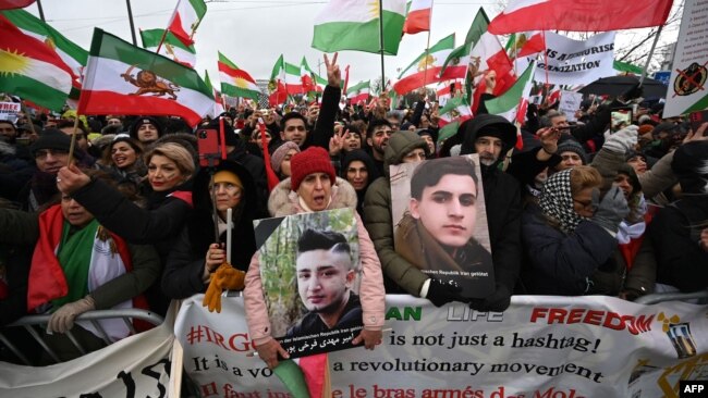 People take part in a rally against the Iranian regime in front of the European Parliament in Strasbourg, eastern France, on Jan. 16, 2023.