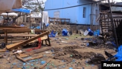 The scene of the bombing in the Democratic Republic of Congo in an attack claimed by the Islamic State.