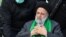 This handout picture provided by the Iranian presidency shows President Ebrahim Raisi speaking at a rally in Iran's central city of Yazd, Jan. 12, 2023. Raisi has vowed that WhatsApp and Instagram will remain blocked in the country.