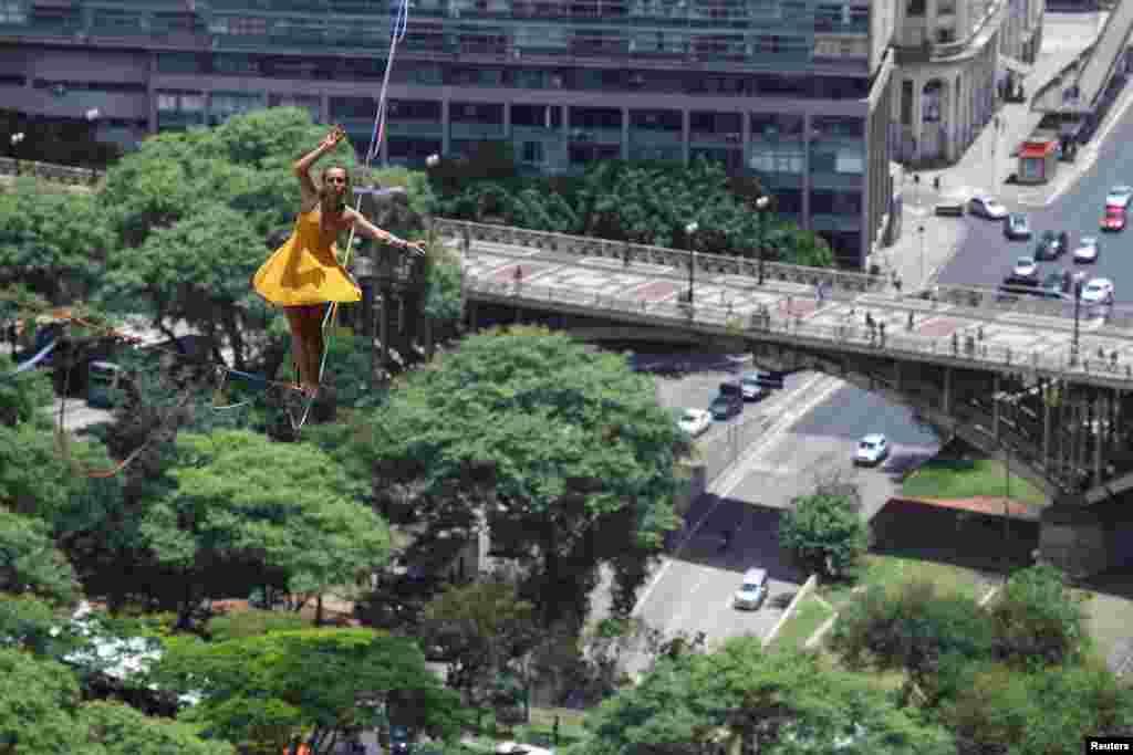 Erika Sedlacek balances on a highline that is 114 meters high and 510 meters long, in Sao Paulo, Brazil.