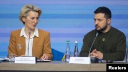 In this Ukrainian Presidential Press Service photo, European Commission President Ursula von der Leyen and Ukrainian President Volodymyr Zelenskyy attend an EU summit in Kyiv, Ukraine, Feb. 2, 2023, as Russia's attack on Ukraine continues.