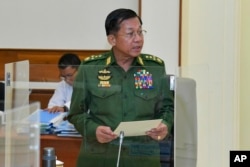 Senior Gen. Min Aung Hlaing talks during the National Defense and Security Council meeting in Naypyitaw, Myanmar, Jan. 31, 2023, in this photo released from the The Military True News Information Team.