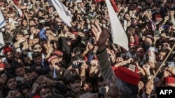 Activists of Awami National Party (ANP) gather during a peace rally following a mosque suicide blast inside police headquarters, in Peshawar, Pakistan, on Feb. 4, 2023.