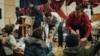 Church members distribute food to local residents after a mass at the Ark of Salvation Church, in Kramatorsk, in Ukraine's eastern Donetsk region, Feb. 12, 2023. 