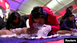 FILE - People learn CPR as part of at an event on the National Mall in Washington, Jan. 19, 2013.