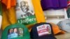 Branded T-shirts and baseball caps with images of Nigerian presidential candidates are displayed at a shopping center in Abuja, Nigeria, Feb. 2, 2023.