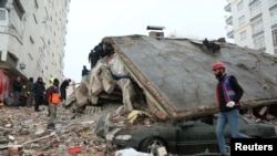 FILE: Rescuers search for survivors under the rubble following an earthquake in Diyarbakir, Turkey. Taken Feb. 6, 2023. 