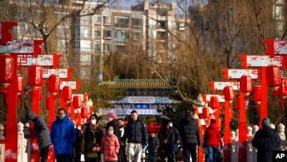 China rings in Lunar New Year with most Covid rules lifted