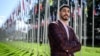 FILE - American basketball player Enes Freedom poses during an interview with AFP at the United Nations Office in Geneva, April 5, 2022. 