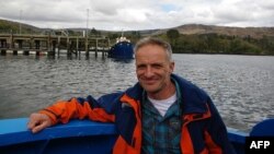 FILE - An undated photograph made available by the family of Bernard Phelan on Jan. 18, 2023, shows Phelan in an undisclosed location. Iran freed Phelan on Friday. He had been held since October.