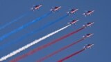 The French elite acrobatic flying team "Patrouille de France" flies over the race track prior to the Women's Super-G event of the FIS Alpine Ski World Championship 2023 in Meribel, French Alps, Feb. 8, 2023. 