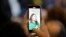 Climate activist Greta Thunberg of Sweden is pictured on a mobile phone while speaking during a press conference at the World Economic Forum in Davos, Switzerland, Jan. 19, 2023.