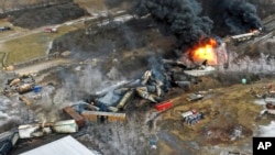 FILE - This photo taken with a drone shows portions of a Norfolk and Southern freight train in East Palestine, Ohio, on Feb. 4, 2023, the day after the rig derailed.