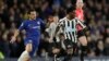 FILE - Chelsea's Pedro, left, and Newcastle United's Christian Atsu, right, vie for the ball during the English Premier League soccer match between Chelsea and Newcastle United at Stamford Bridge stadium in London, Jan. 12, 2019. 
