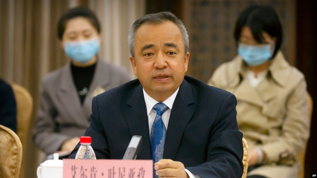 FILE - In this April 22, 2021, photo, Erkin Tuniyaz speaks during a press conference in Urumqi in northwestern China's Xinjiang Uyghur Autonomous Region.
