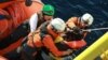 A migrant is rescued by members of Doctors Without Borders (MSF) during a search and rescue (SAR) operation in the Mediterranean Sea, Jan. 25, 2023. Mohamad Cheblak/Doctors without Borders/Handout via REUTERS