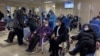 Patients receive intravenous drips in an emergency ward in Beijing, Jan. 19, 2023. 