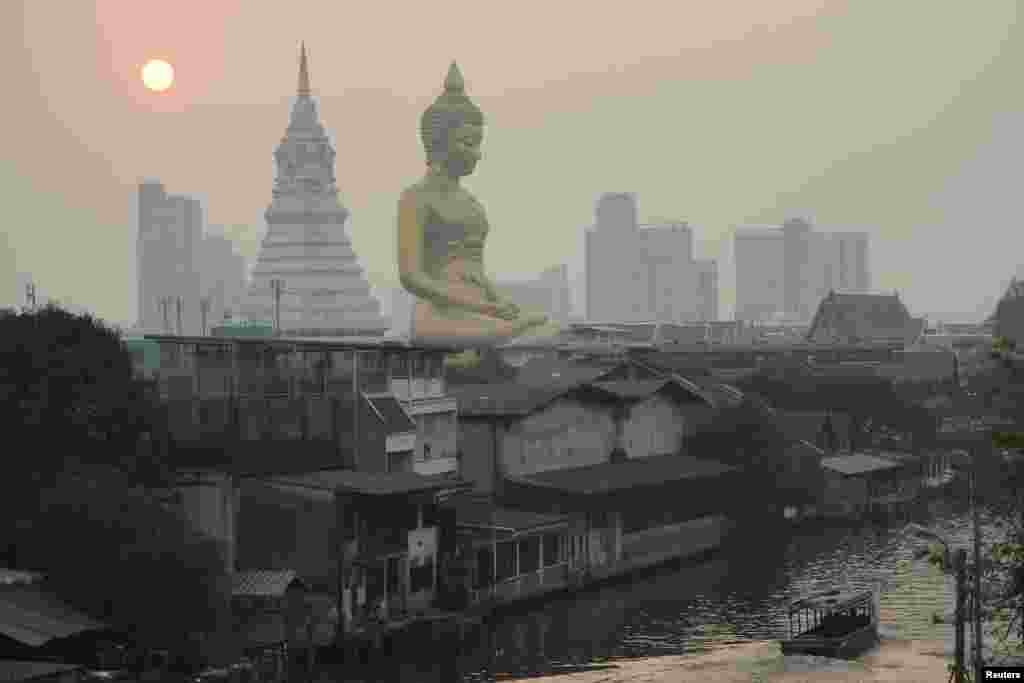 The giant Buddha statue of Wat Paknam Phasi Charoen temple is seen amid air pollution in Bangkok, Thailand, February 2, 2023.