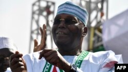 Peoples Democratic Party candidate Atiku Abubakar appears at a campaign rally in Kano, northwest Nigeria, on Feb. 9, 2023, ahead of the February 25 presidential election.