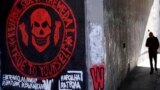 (FILE) A mural depicting the logo of Russia's Wagner Group on a wall.